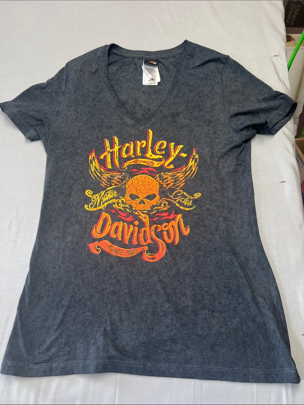 Harley-Davidson Black V-Neck Tee with Yellow & Orange Skull Graphic